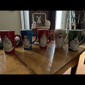 Set of 5 large ceramic mugs.  Snowmen designs.